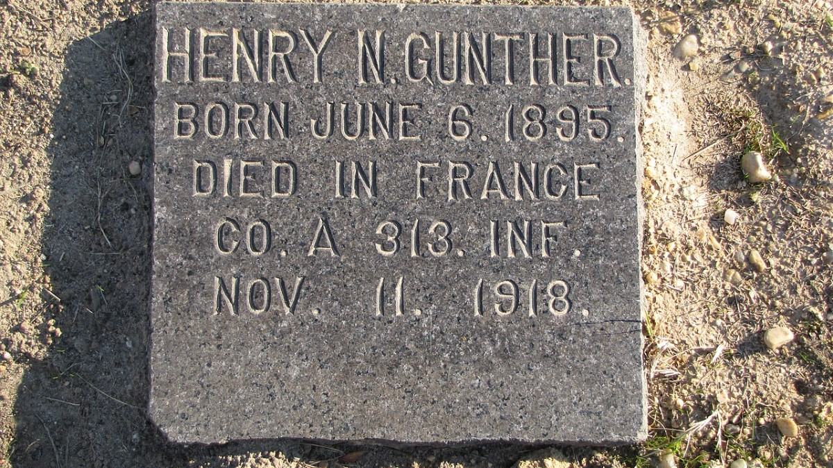 Flat granite headstone carved HENRY N. GUNTHER, BORN JUNE 6. 1895, DIED IN FRANCE, CO. A 313. INF., NOV. 11. 1918