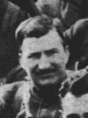 Black-and-white portrait of Henry Gunther, a young man with dark hair, before 1918